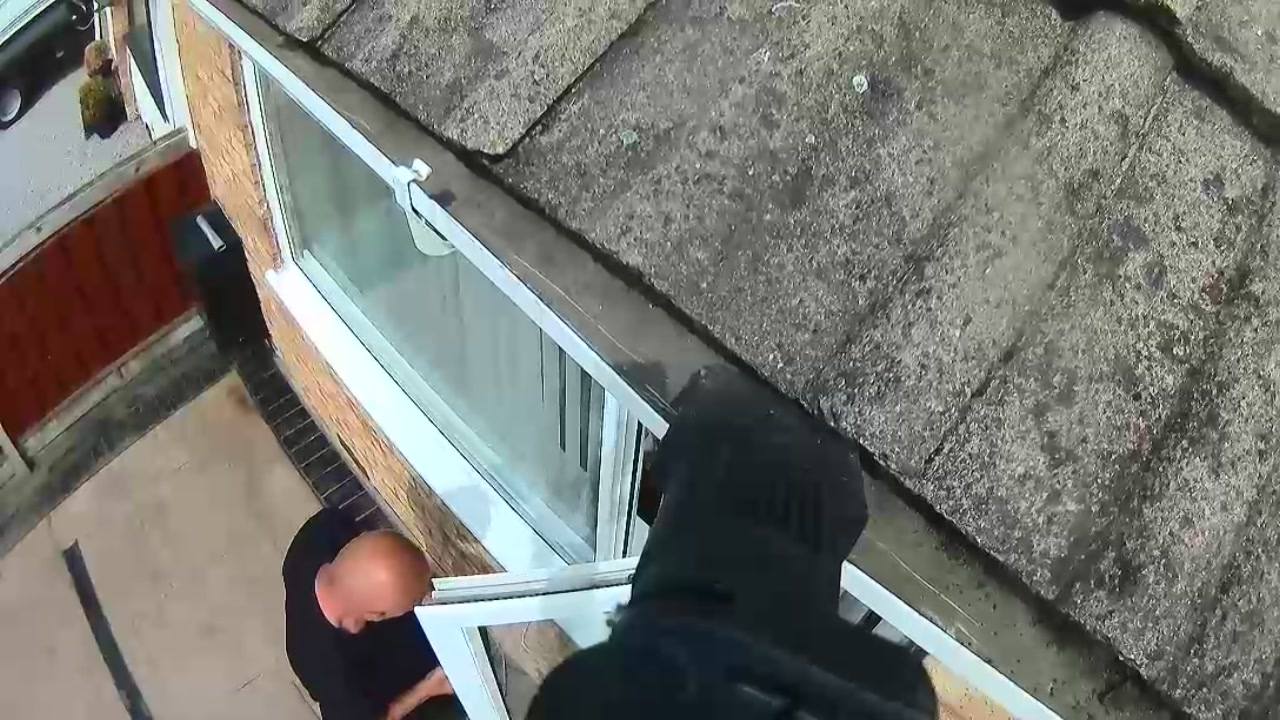Gutter repair on a brick building
